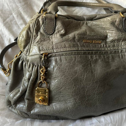 PreOwned MIU MIU NAPPA LEATHER MINI CHARM BAG